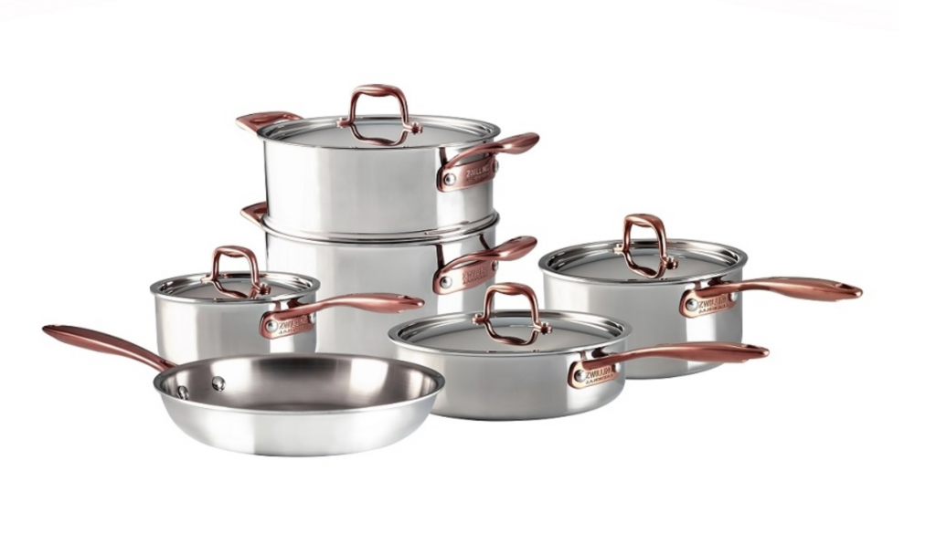 Stainless steel 10 piece cookware set with rose gold handles and finishes.