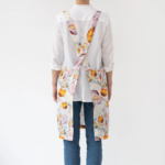 Linen Tales Crossback Apron - Orange Flow on Natural - Image 2