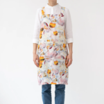 Linen Tales Crossback Apron - Orange Flow on Natural