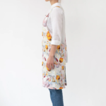 Linen Tales Crossback Apron - Orange Flow on Natural - Image 3